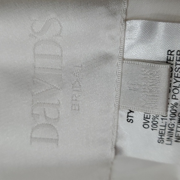 Wedding dress, David's Bridal, NWT. Size 6. Ivory lace and satin. Low V back. - Picture 11 of 16